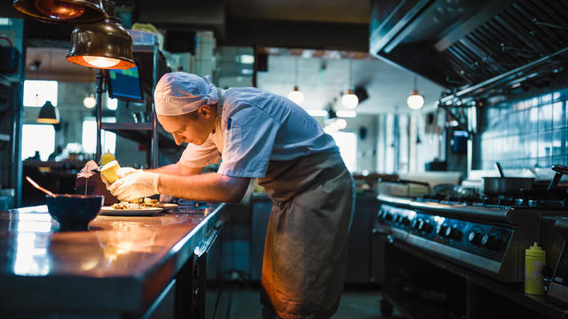 Chef serving food 