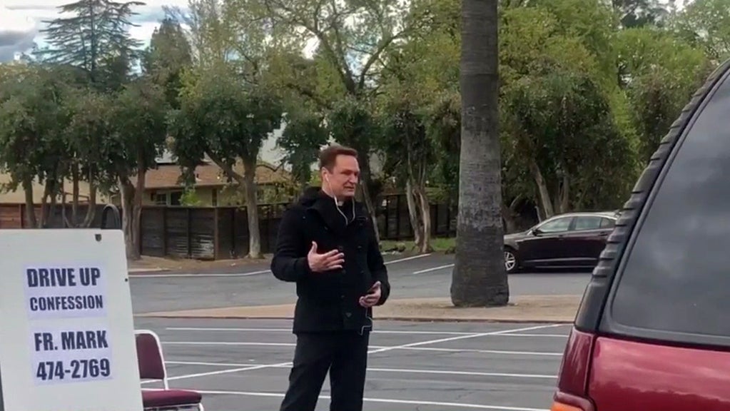 Rev. Mark Wiesner Receives a Confession in Pleasanton 