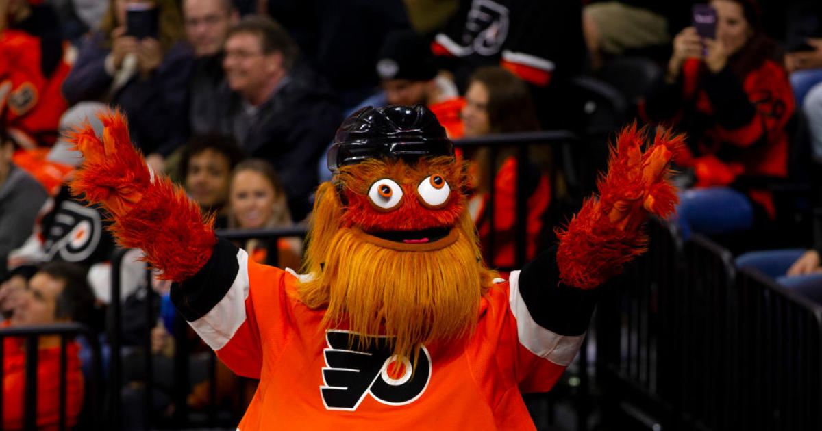 Philadelphia Flyers mascot Gritty waves to fans during the NHL All-Star  Game on Saturday, Feb. …