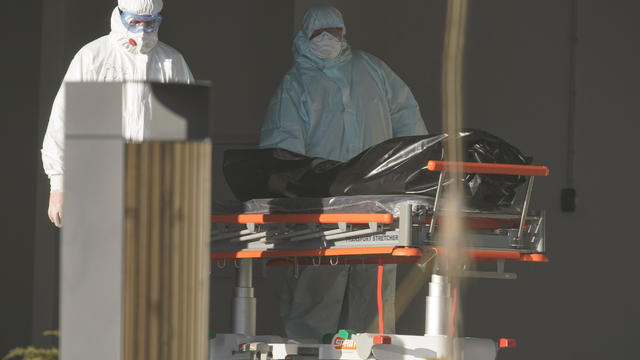 Medical specialists push a stretcher in a hospital for patients infected with the coronavirus disease on the outskirts of Moscow 