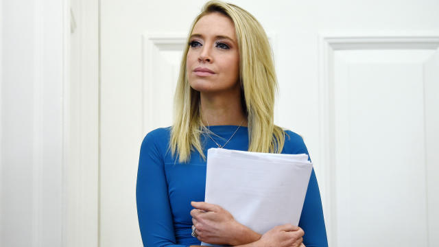 White House press secretary Kayleigh McEnany looks on during a signing ceremony for the Paycheck Protection Program and Health Care Enhancement Act in the Oval Office of the White House in Washington on April 24, 2020. 