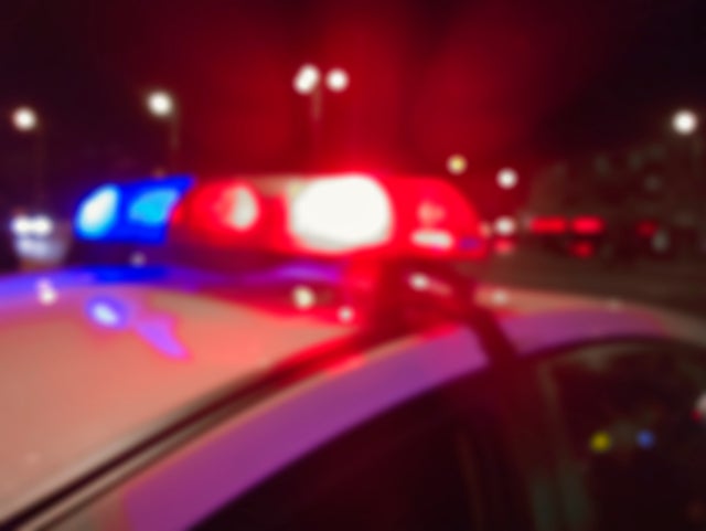 Red and blue police lights night time, crime scene.