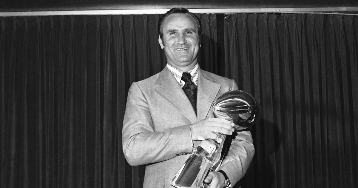 Coach of the Miami Dolphins' perfect season, Don Shula, with quarterback Bob  Griese during a halftime ceremony celebrating the undefeated 1972 team as  the Dolphins play host to the Cincinnati Bengals on