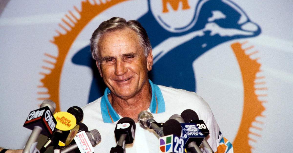 Coach of the Miami Dolphins' perfect season, Don Shula, with quarterback Bob  Griese during a halftime ceremony celebrating the undefeated 1972 team as  the Dolphins play host to the Cincinnati Bengals on