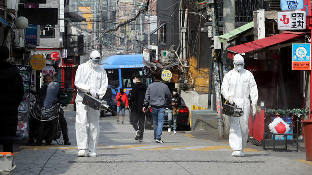 Quarantine workers spray disinfectants at night spots of Itaewon neighborhood, following the coronavirus disease (COVID-19) outbreak, in Seoul 