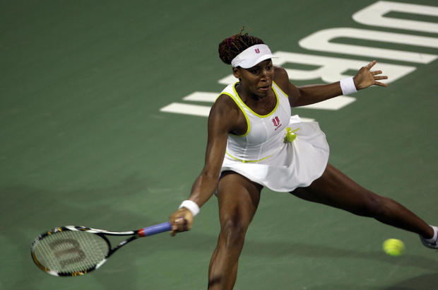 Venus Williams of the US returns to her 