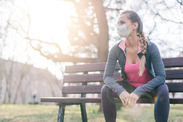 Woman  sport coronavirus crises face mask 