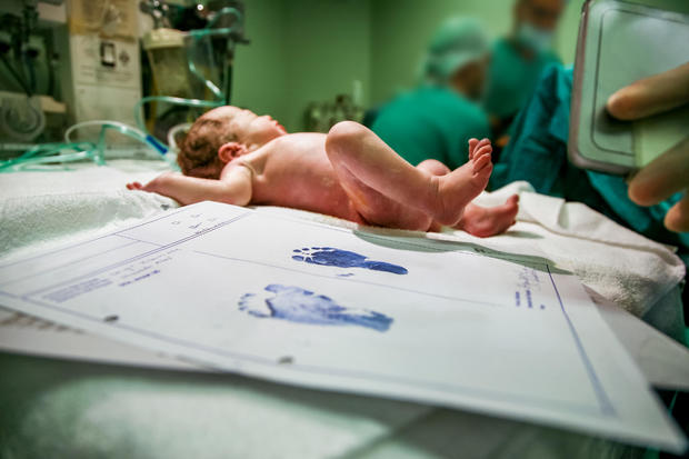 Newborn Baby and Foot Steps 