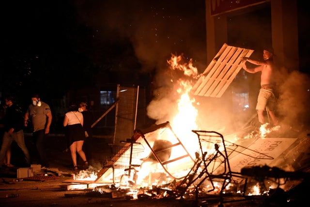 Protesters gather near the Minneapolis Police third precinct