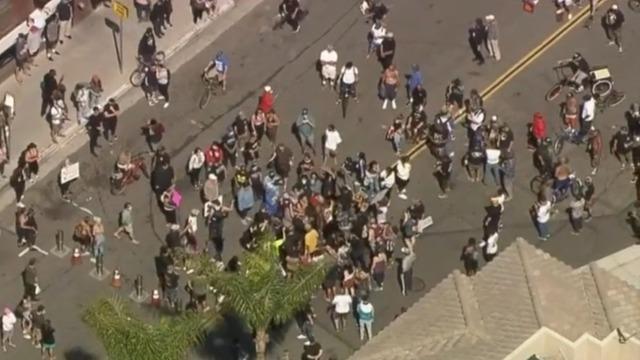 cbsn-fusion-unlawful-assembly-declared-huntington-beach-california-pch-protesters-thumbnail-493157-640x360.jpg 