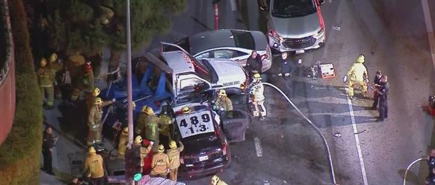2 Officers Among 8 Injured After Tow Truck Driver Runs Red Light In South LA 