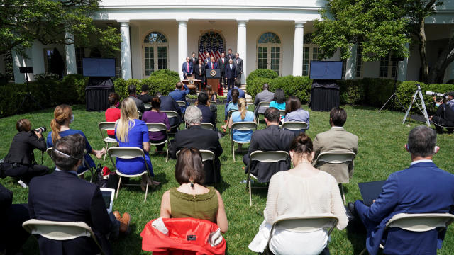 Journalists are seated close together at the White House in Washington 