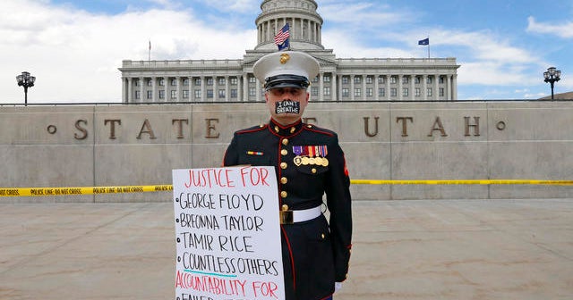 Marine holds silent protest outside Utah State Capitol CBS News