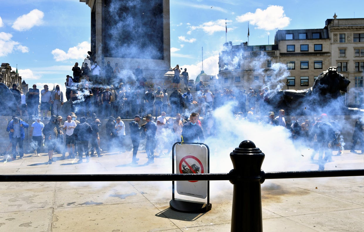Right-wing protesters clash with police in London - CBS News