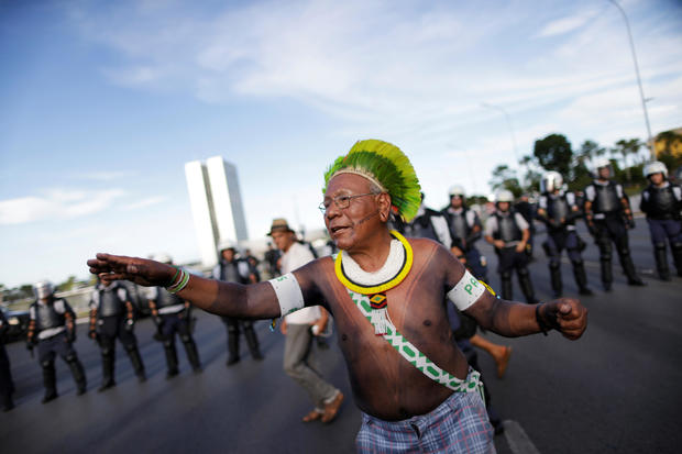 Indigenous leader Paulinho Paiakan of Kayapo tribe, takes part a protest against Brazil's president Michel Temer for the violation of indigenous people's rights, in Brasilia 