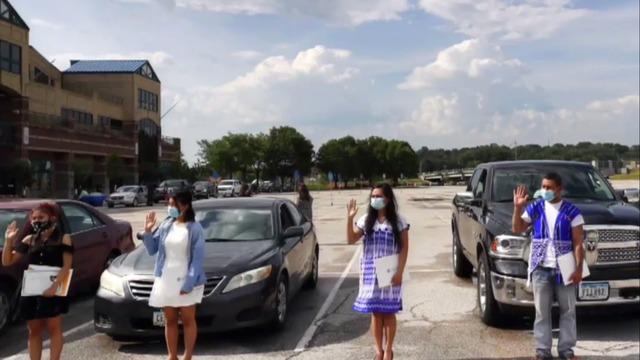 cbsn-fusion-drive-thru-ceremonies-for-new-american-citizens-amid-pandemic-thumbnail-509100-640x360.jpg 