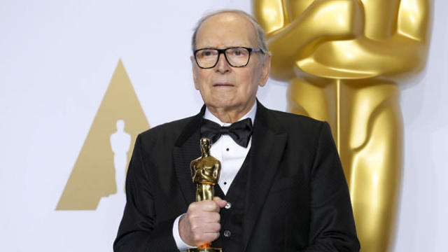 FILE PHOTO: Italian movie composer Morricone conducts the Sinfonietta orchestra during a Christmas concert in Milan 