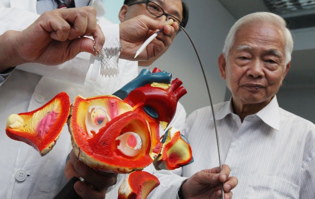 Chan Man-nang (right), age 79, who suffered from Aortic Stenosis (most common valvular heart disease in the elderly), was the first patient to have undergone Transcatheter Aortic Valve Implantation (TAVI) at Queen Elizabeth Hospital, which is the first ho 