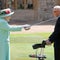 Queen Elizabeth knights 100-year-old national treasure, Captain Tom Moore