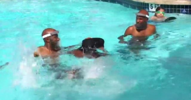 Texas twins teach children how to swim with a splash of confidence - CBS News
