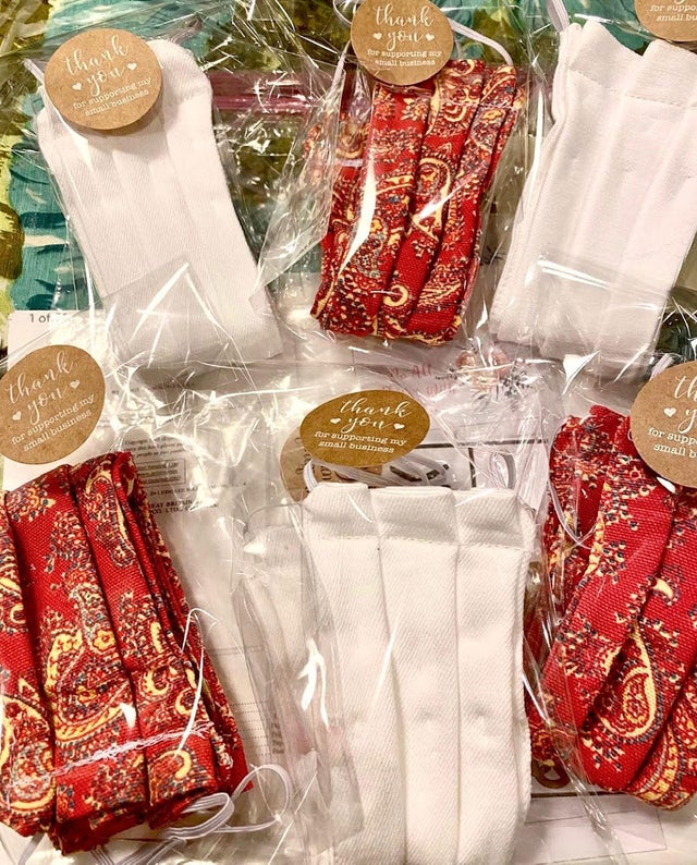 Couple restores 100-year-old sewing machine to make face masks 