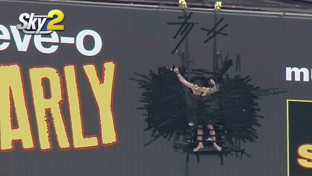 steve-o-taped-to-billboard.jpg 