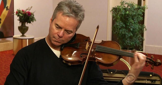 Violinist reunited with his 300-year-old partner - CBS News