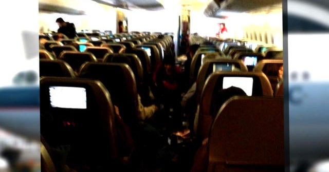 Turbulence injures passengers on flight to Hong Kong - CBS News