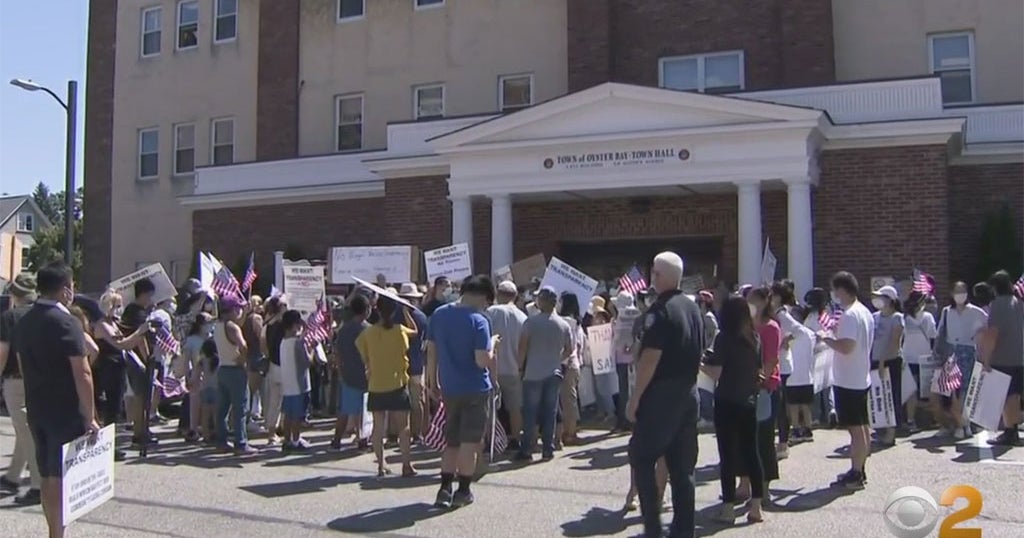 Long Island Residents Rally Outside Oyster Bay Town Hall To Protest New