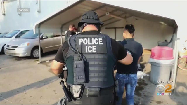ICE-Detaining-Person.jpg 
