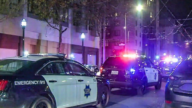 SFPD patrol cars at crime scene 