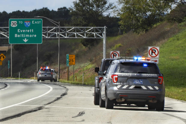 Pennsylvania State troopers pull over vehicles on September 4, 2020, along the Pennsylvania Turnpike in Breezewood, Pennsylvania. 