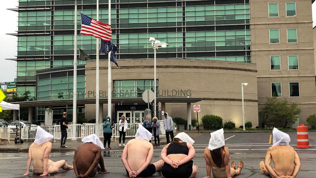 Naked protesters stage a demonstration to protest the death of Daniel Prude in Rochester 