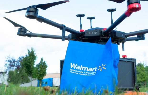 A Flytex delivery drone with a Walmart bag 