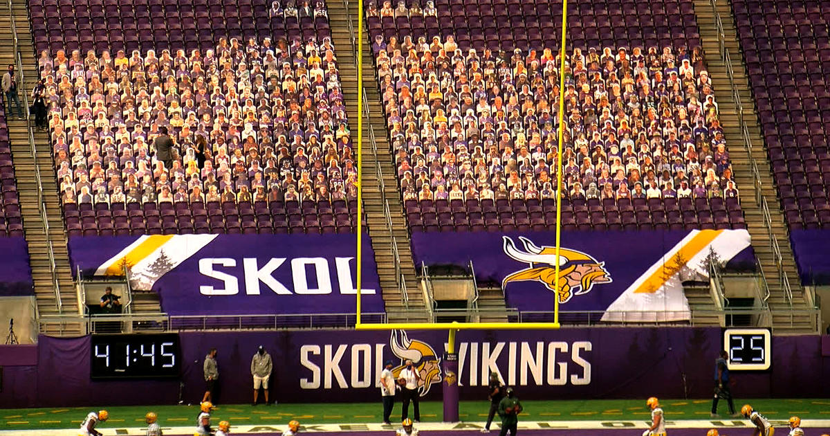 Cutouts of Minnesota Vikings fans are shown in the stands of US