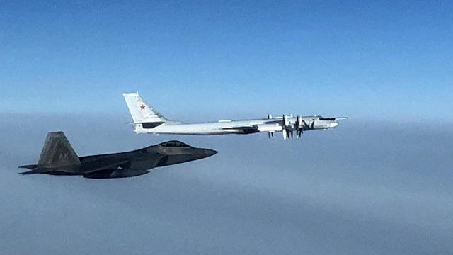 A U.S. F-22 fighter jet intercepts a Russian Tu-35 bomber in international airspace near Alaska October 19, 2020. 