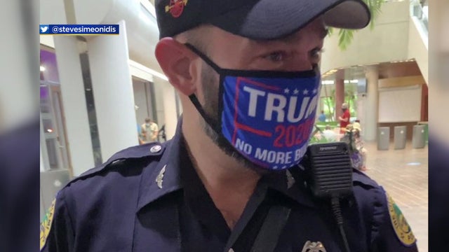 officer-with-trump-mask-pic_1.jpg 