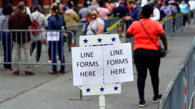 Voters line up to cast their election ballot in Marietta 