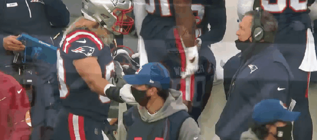 Chase Winovich and Bill Belichick 