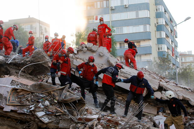 Rescue operations take place on a site after an earthquake struck the Aegean Sea, in the coastal province of Izmir 
