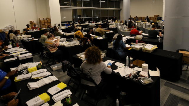 Employees of the Fulton County Board of Registration and Elections process ballots in Atlanta 