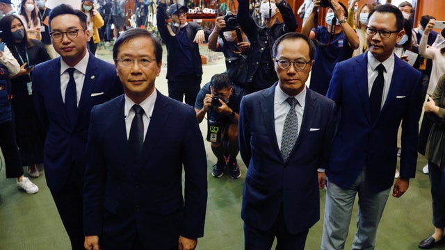 Former pan-democratic legislators Alvin Yeung Ngok-kiu, Kwok Ka-ki, Kenneth Leung and Dennis Kwok speak to the media after they were disqualified when China passed a new resolution in Hong Kong 
