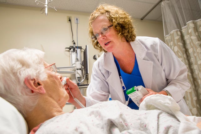 Nurse caring for patient