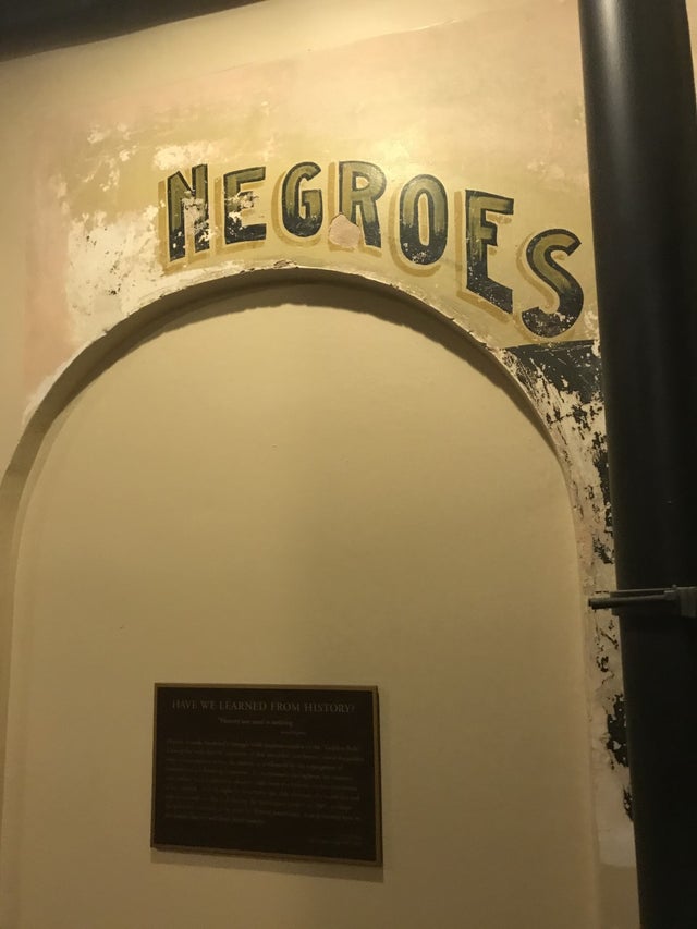 Sign and plaque in Ellis County Historic Courthouse 