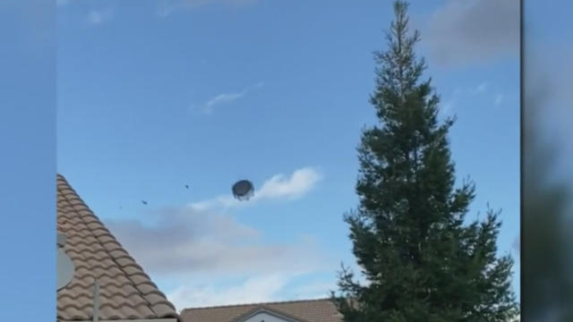 trampoline-sent-airborne-by-high-winds.jpg 