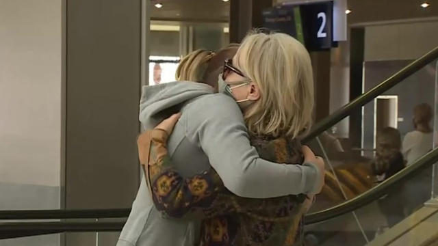 hugging-at-airport-covid.jpg 