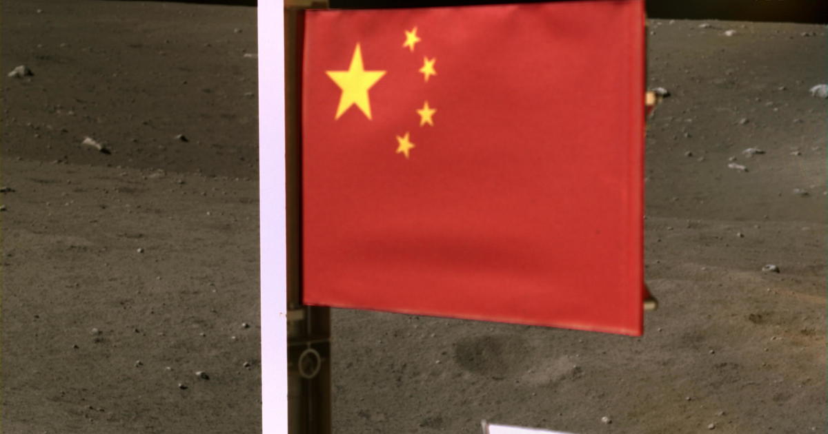 China releases image of its flag on the moon as spacecraft carrying lunar rocks lifts off