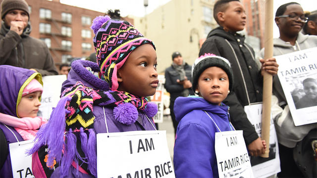 Kids-with-Tamir-Rice-signs.-Stop-Mass-Incarcerations-Network.jpg 
