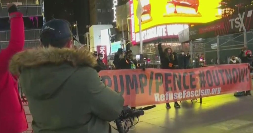 Protesters Rally In Times Square To Call For Removal Of President Trump ...