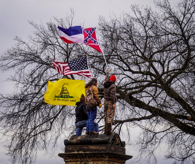 Trump supporters wave flags 
